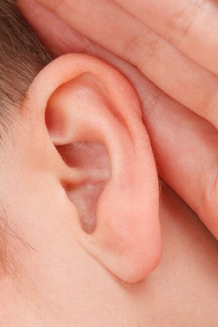 Burning left or right ear is symbolism