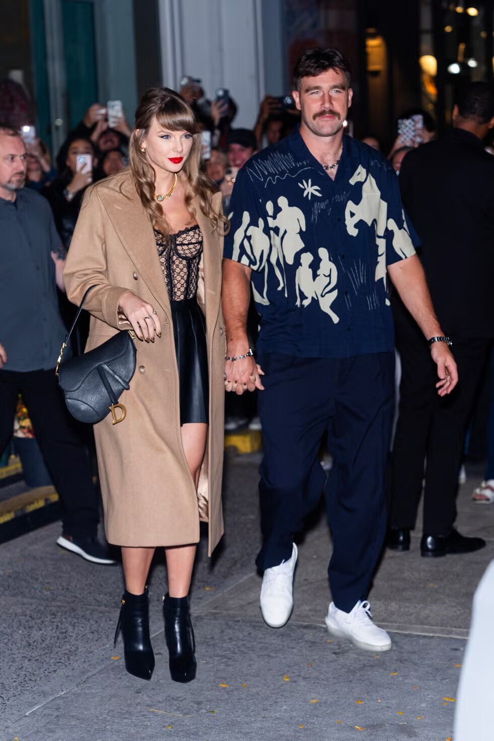 Travis Kelce and Taylor Swift Show Off Matching Louis Vuitton Jewelry