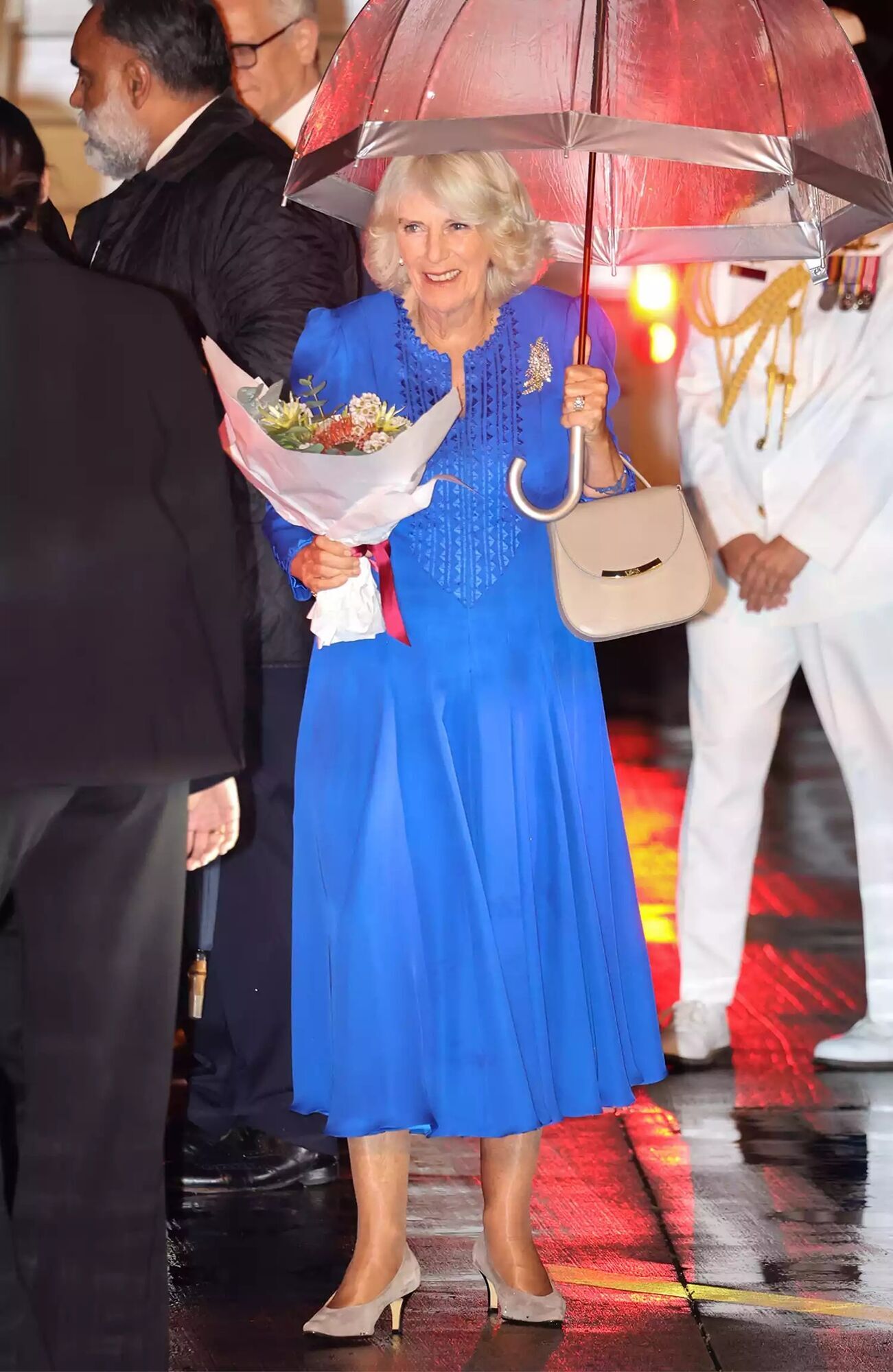 Queen Camilla with her posy shortly after arriving in Sydney, Australia on Oct. 18, 2024.