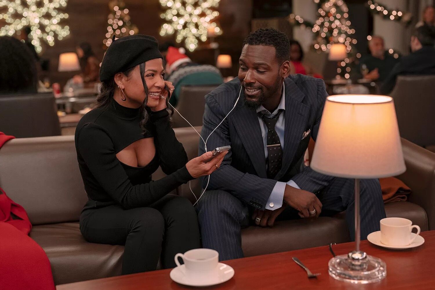 Christina Milian as Layla and Kofi Sirboe as James in "Meet Me Next Christmas".