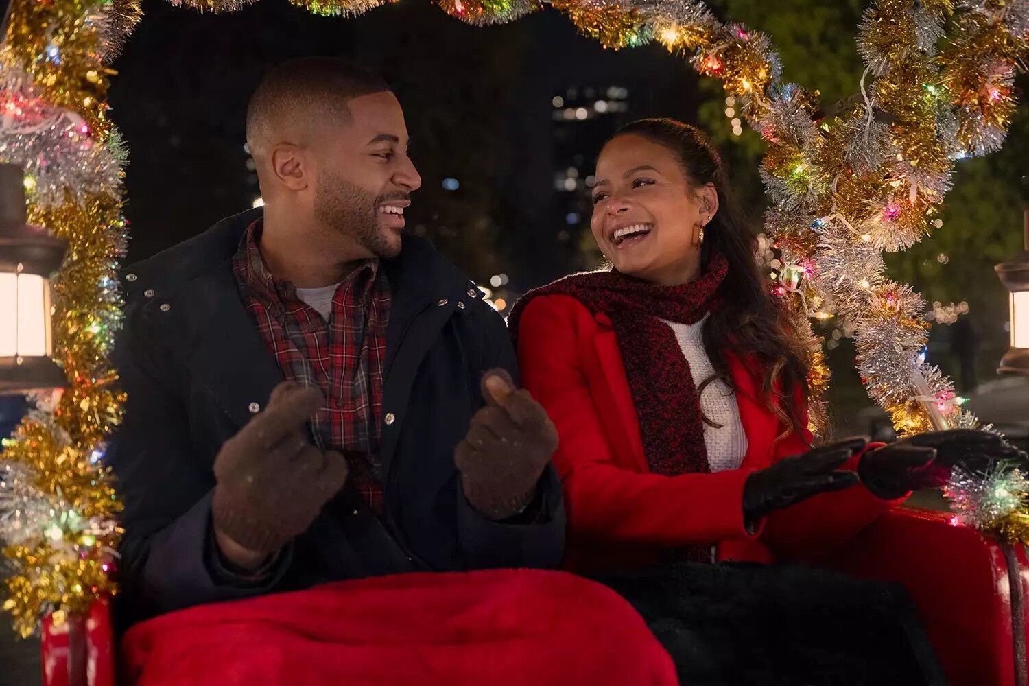 Devale Ellis as Teddy and Christina Milian as Layla in "Meet Me Next Christmas".