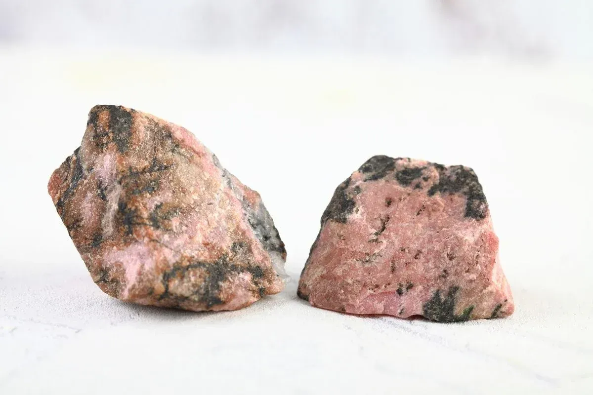 11 Spiritual Meanings of Rhodonite