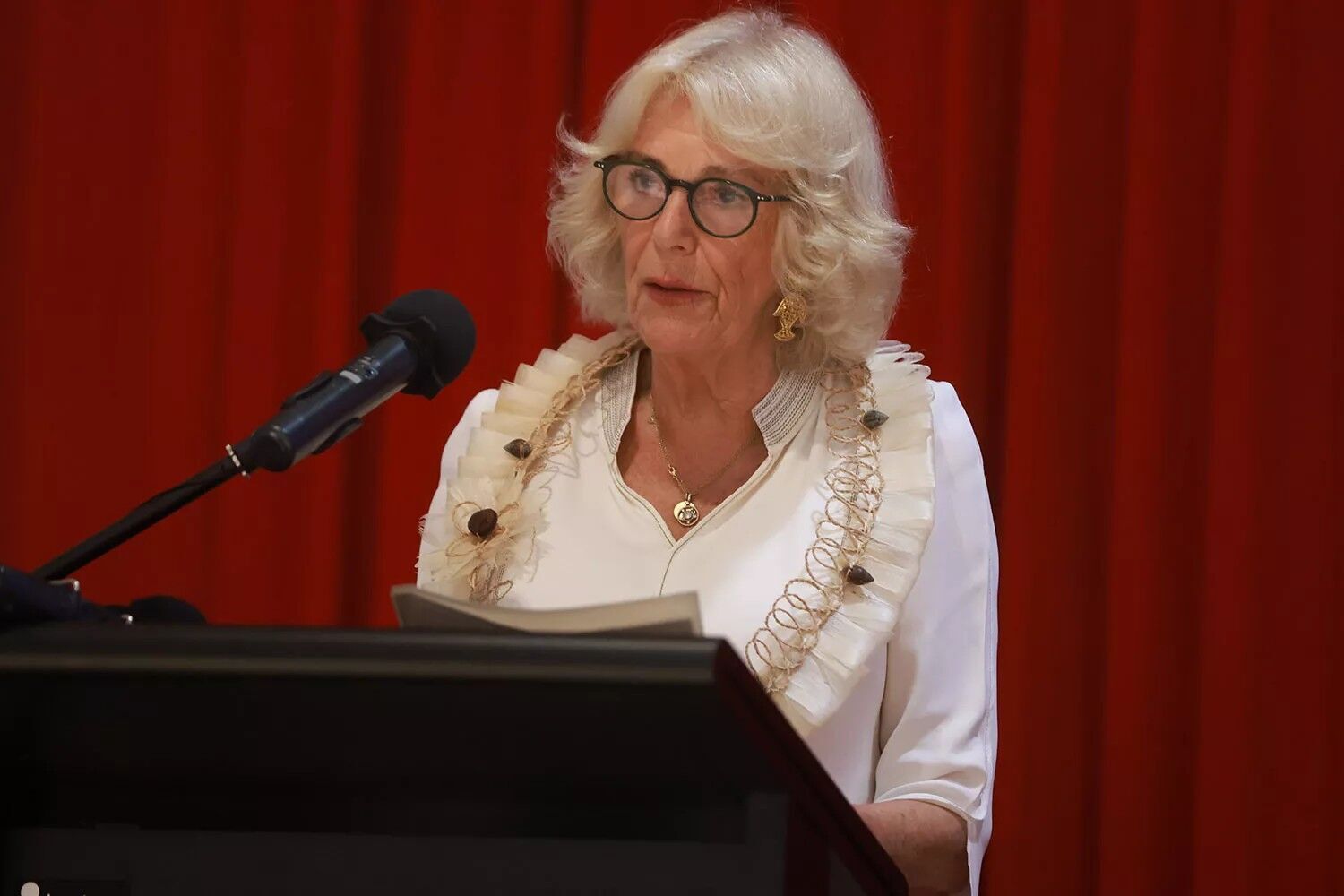 Queen Camilla talking at an event tackling violence against women and girls on Oct. 24, 2024