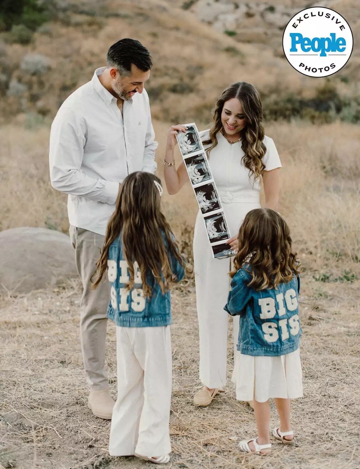 Jeremy Vuolo and Jinger Duggar Vuolo are pictured unveiling their pregnancy news to their two daughters.