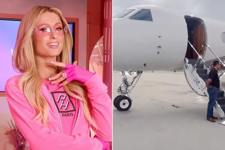 Paris Hilton pictured alongside her private jet.