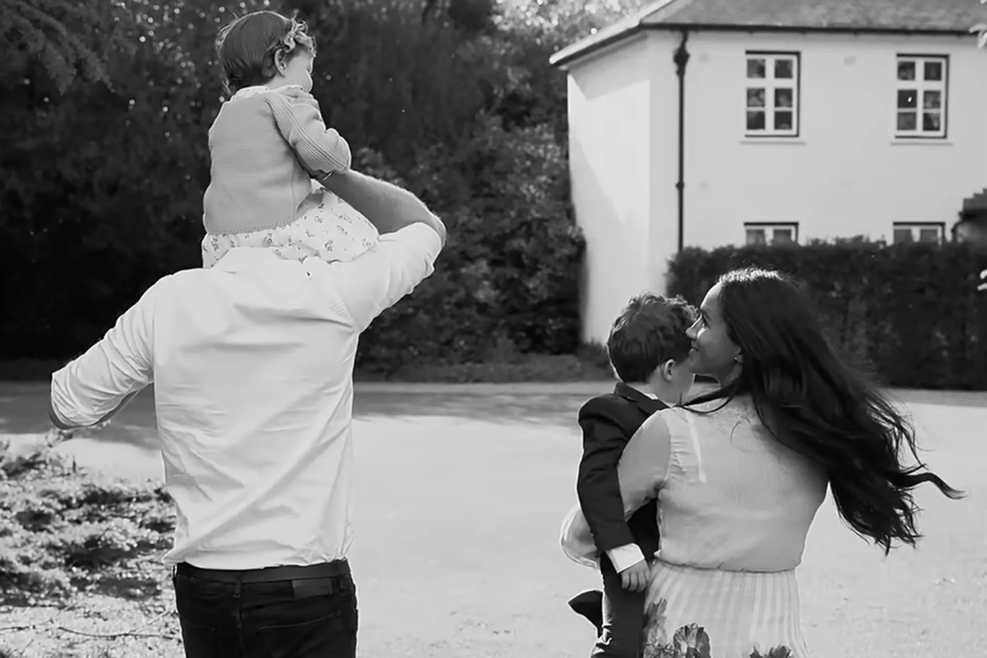 A photo of Prince Harry, Princess Lilibet, Meghan Markle and Prince Archie from the docuseries “Harry & Meghan" on Netflix.