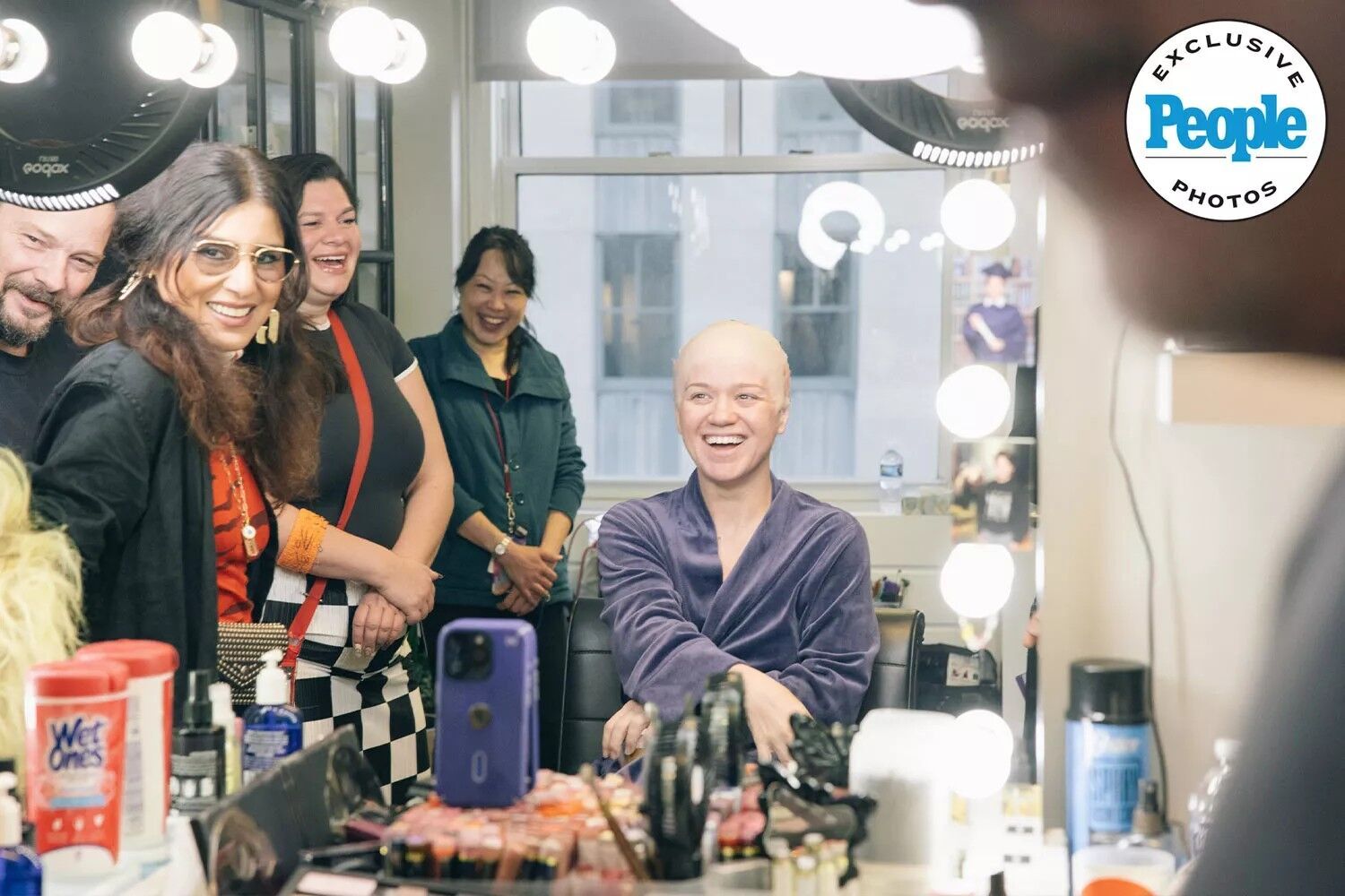 Kelly Clarkson (center) with her glam team before her Halloween transformation into Beetlejuice