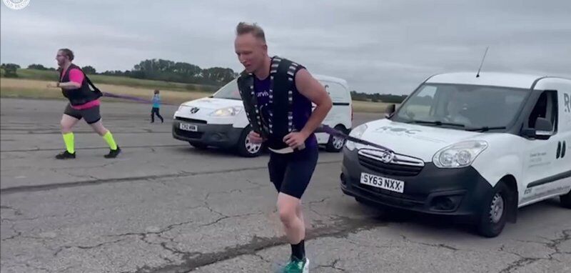 Brothers-in-Law Break Their Own Record by Pulling Cars