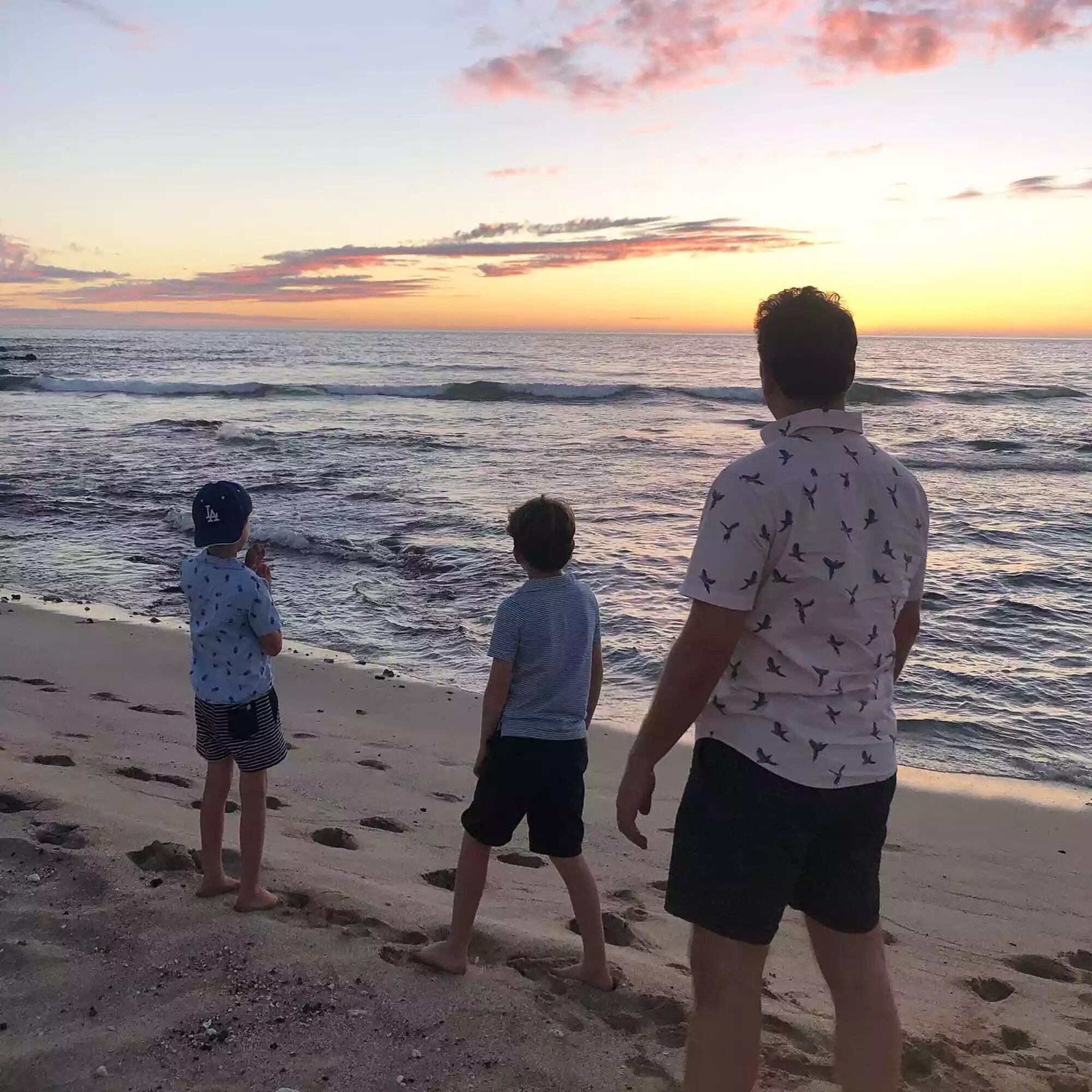 Max Handelman with kids Magnus and Felix on the beach.