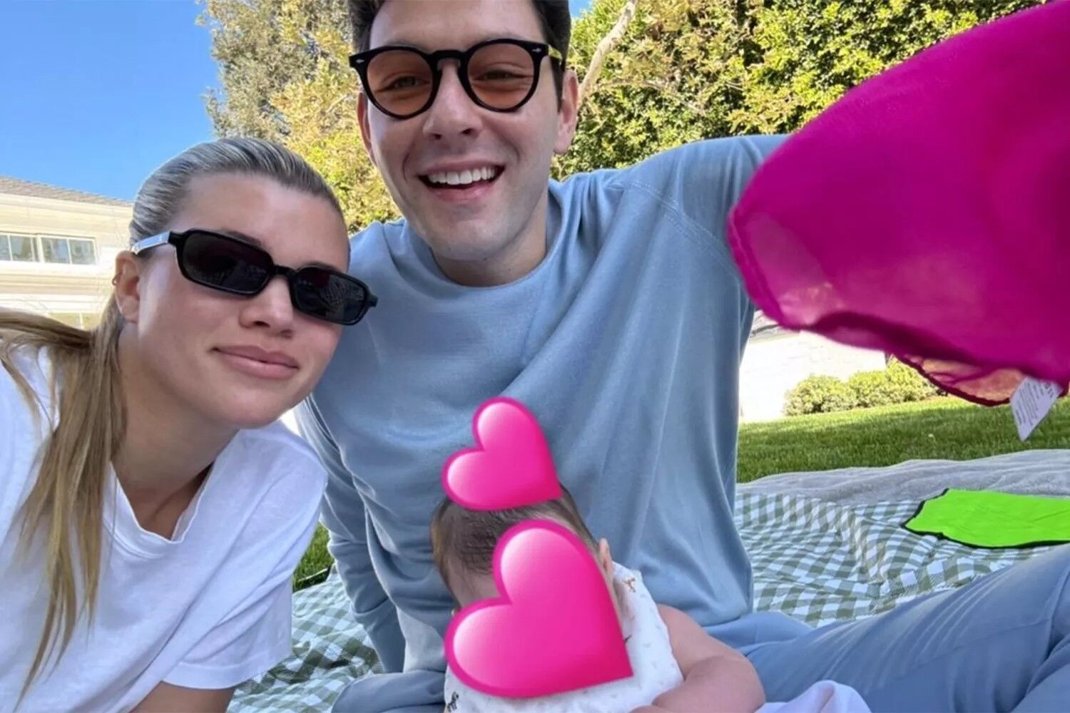 Sofia Richie and Elliot Grainge with their daughter.