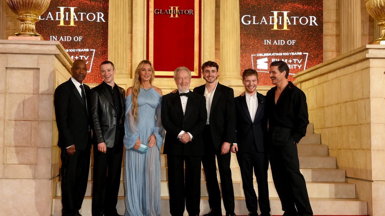 From left to right, Denzel Washington, Joseph Quinn, Connie Nielsen, Sir Ridley Scott, Paul Mescal, Fred Hechinger and Pedro Pascal attend the Royal Film Performance and Global Premiere of "Gladiator II."