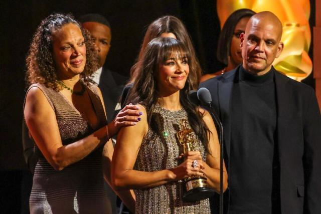 Martina, Rashida and Quincy III accepting their father Quincy Jones' honorary Oscar at the 15th Annual Governors Awards in L.A. on Nov. 17