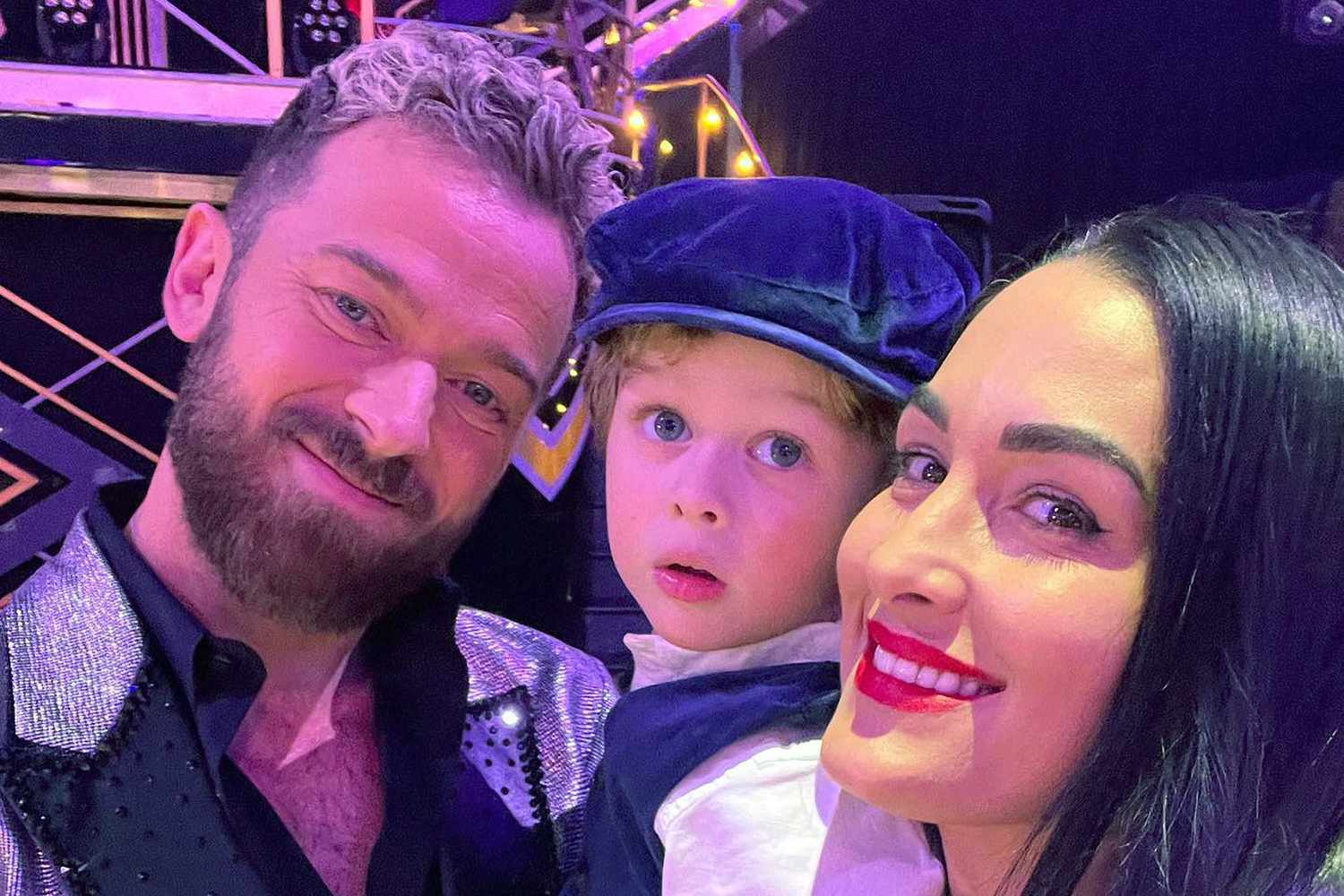 Nikki Bella, Artem Chigvintsev, and their son Matteo