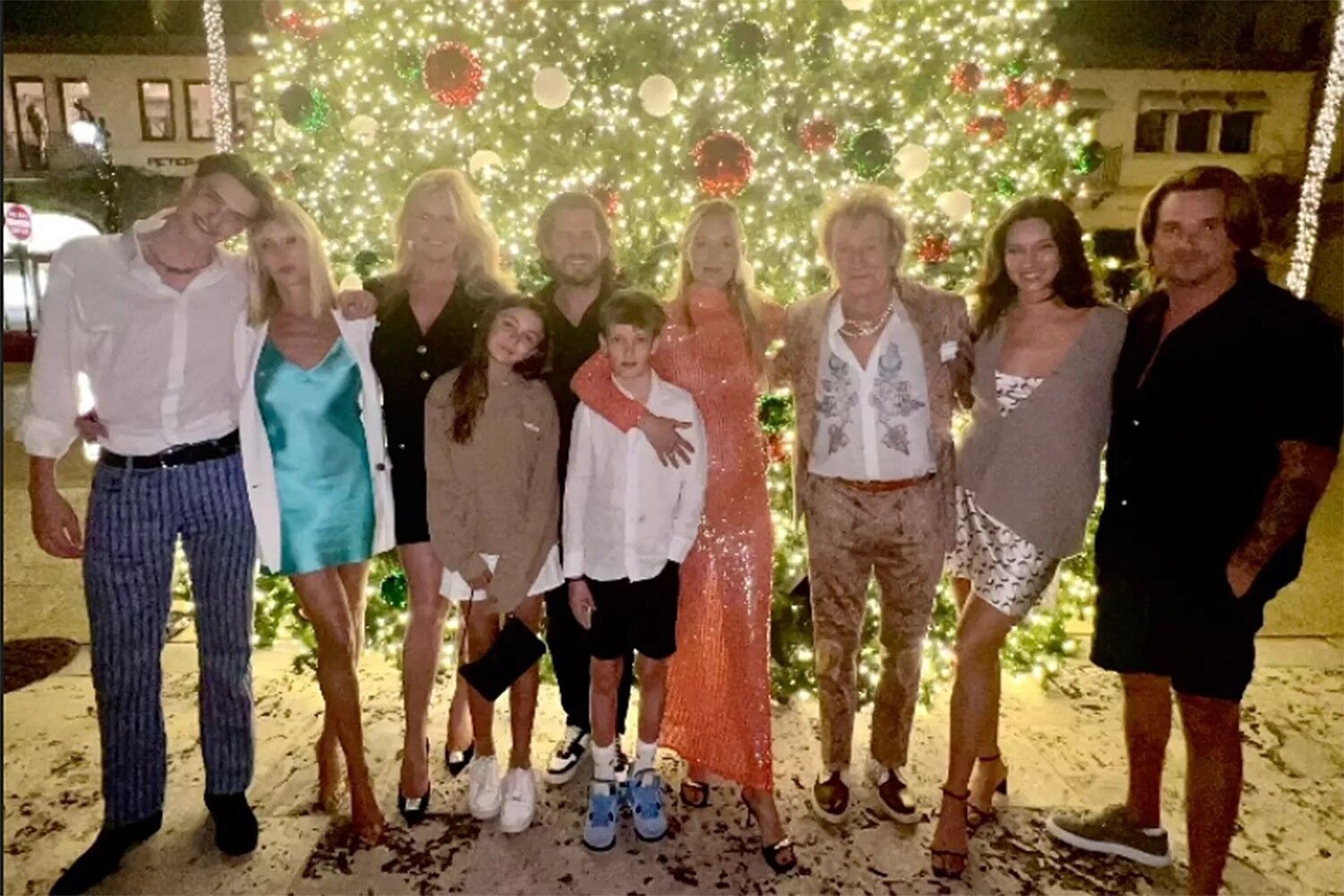 Rod Stewart and his wife Penny Lancaster with six of his eight children.