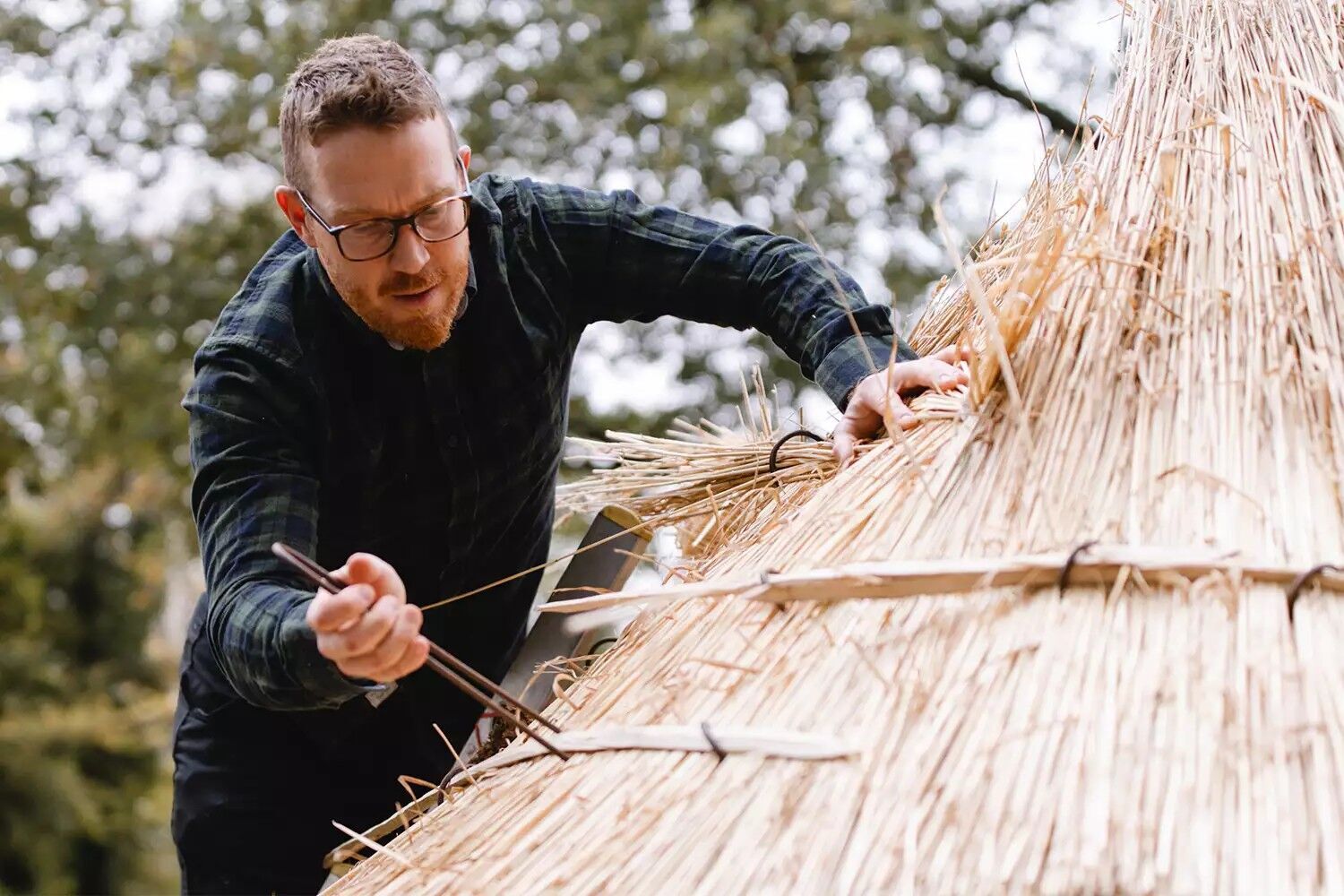 Ben Collyns working on the treehouse at Highgorve House, Gloucestershire.