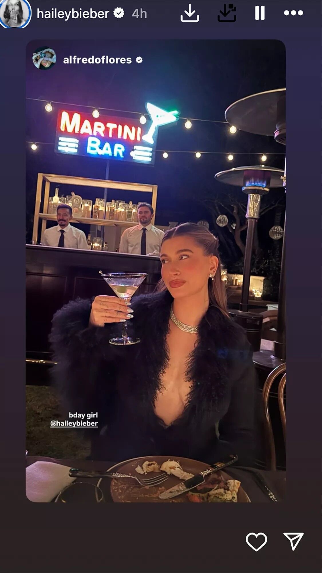 Hailey Bieber snapped posing with a martini at her 28th birthday party