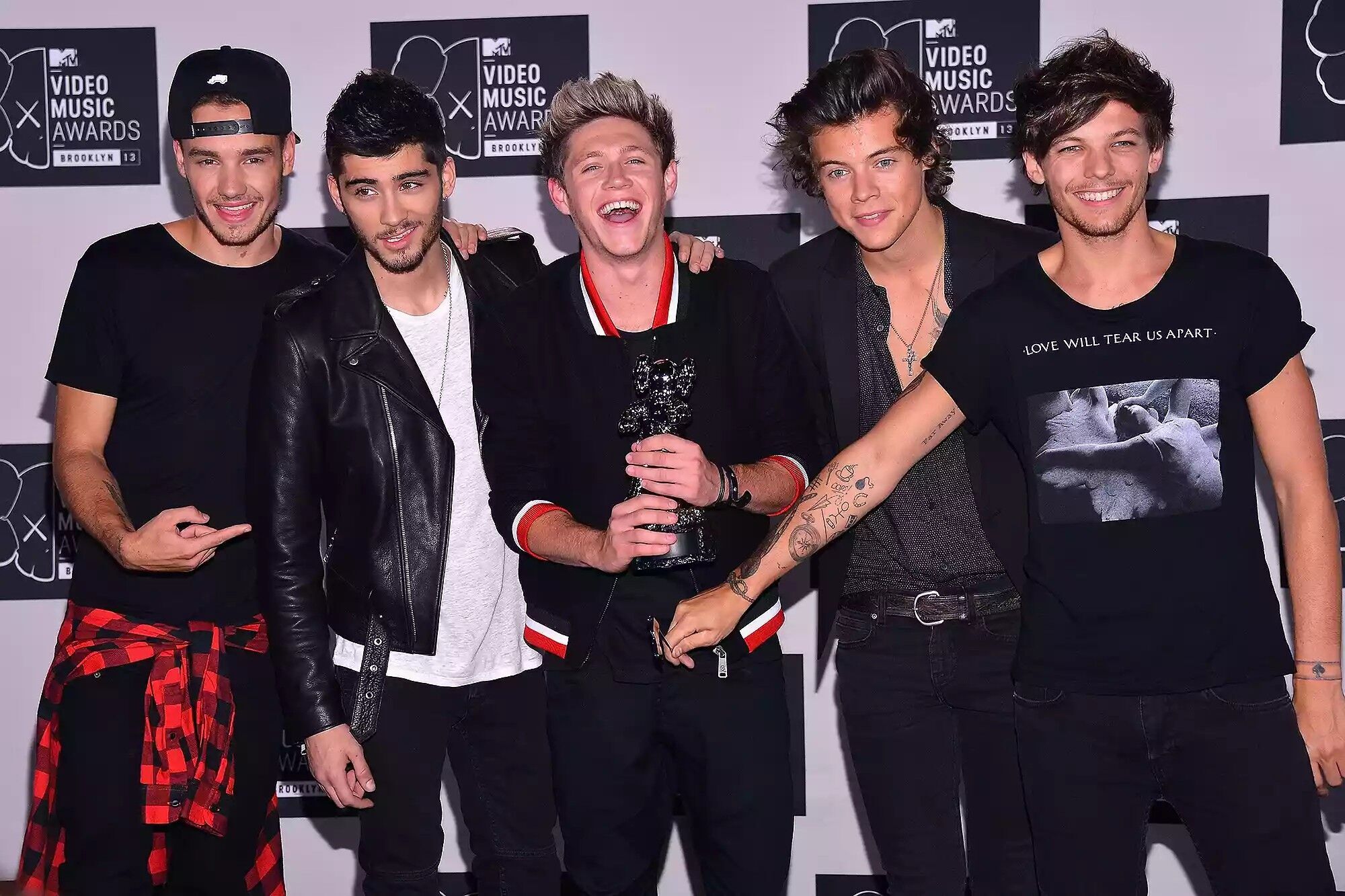 (L-R) Liam Payne, Zayn Malik, Niall Horan, Harry Styles and Louis Tomlinson in August 2013