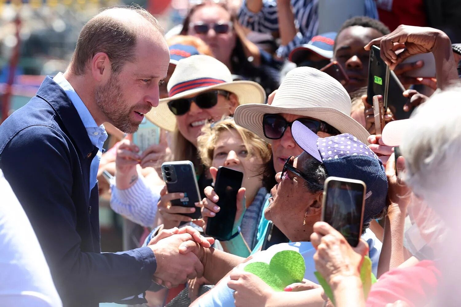 Prince William talks to the public at Kalk Bay Harbor.