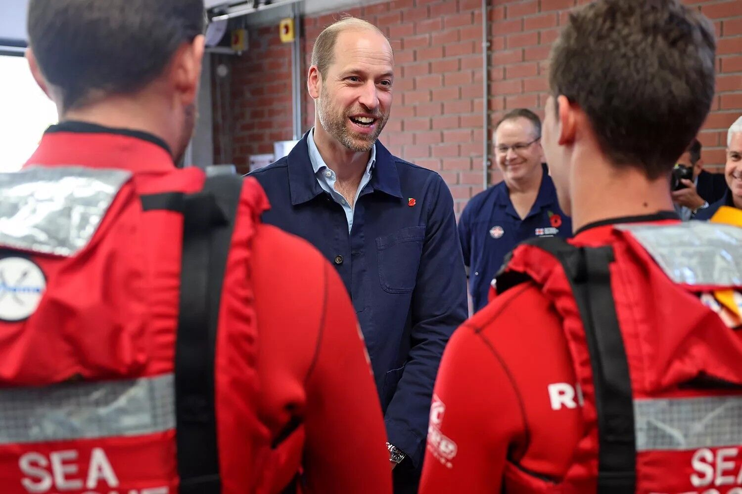 Prince William meets life boat crews in Cape Town.