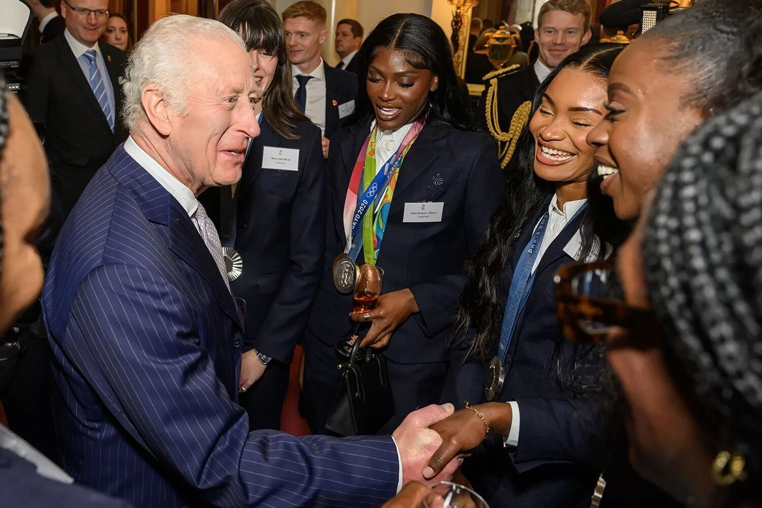 King Charles meets Olympians during a reception for Team Great Britain athletes who medaled at the 2024 Paris Olympic and Paralympics Games at Buckingham Palace on Nov. 7, 2024.