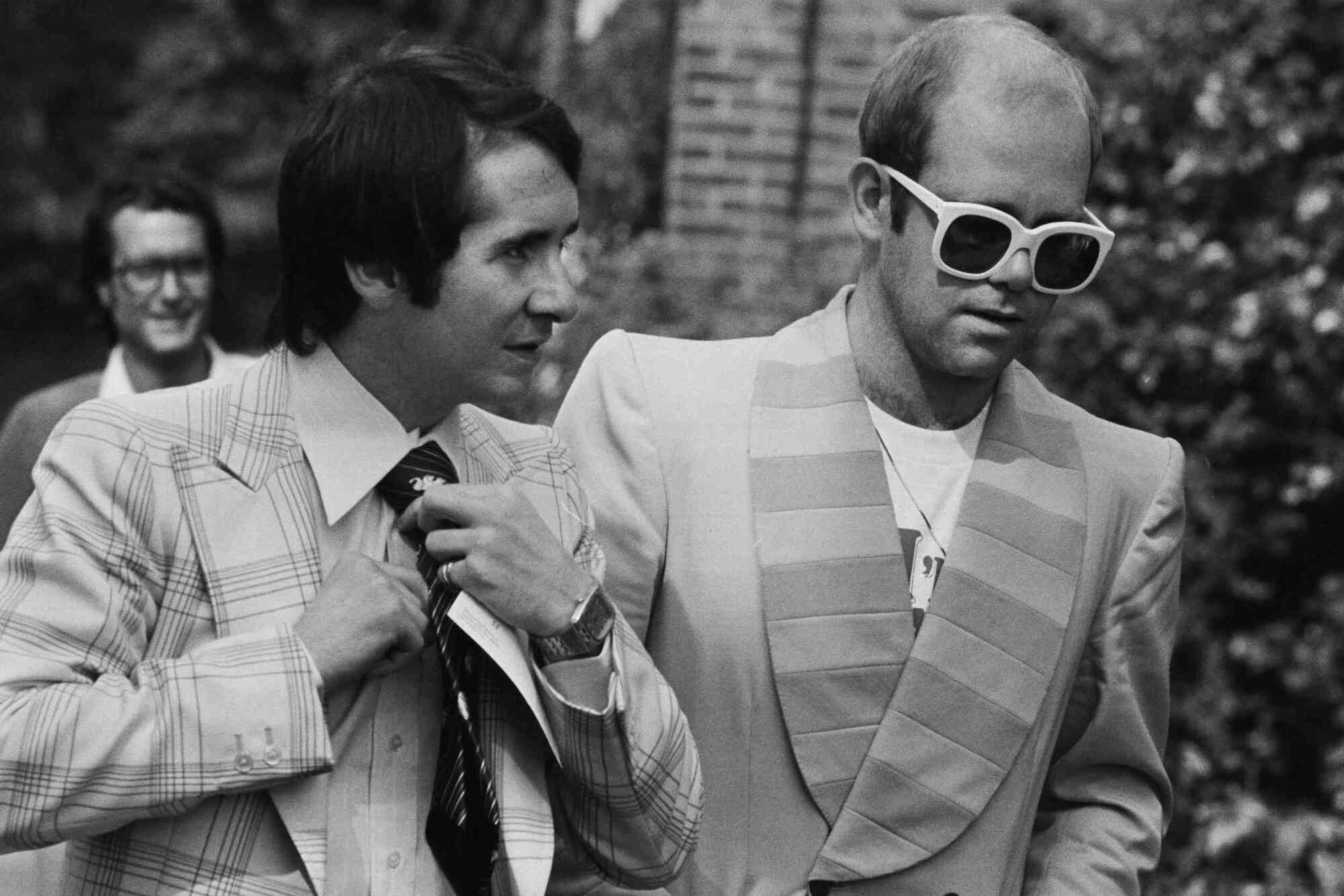 John Reid (left) and Elton John in 1976.