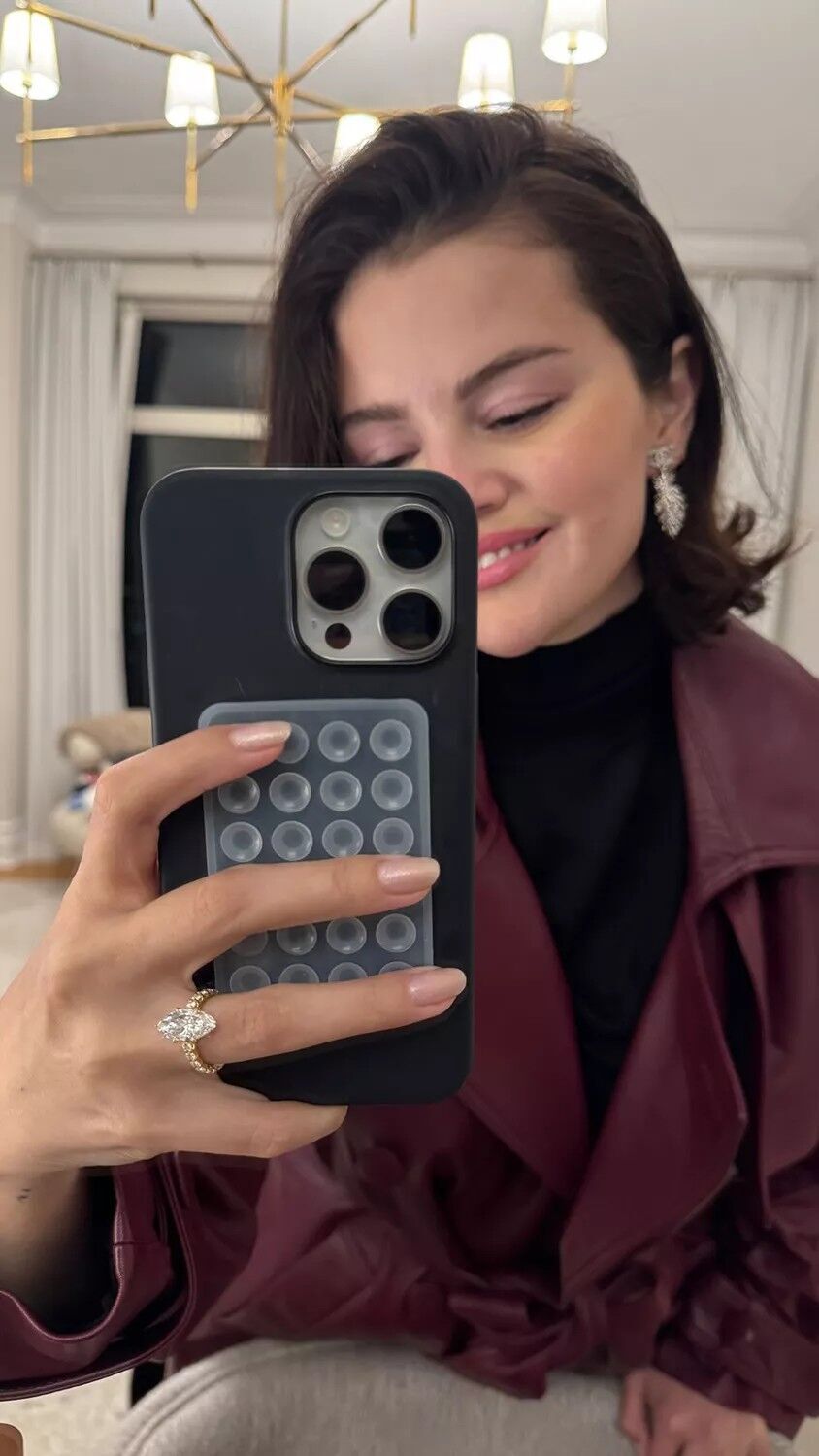 Selena Gomez shares new selfie showing off her engagement ring.