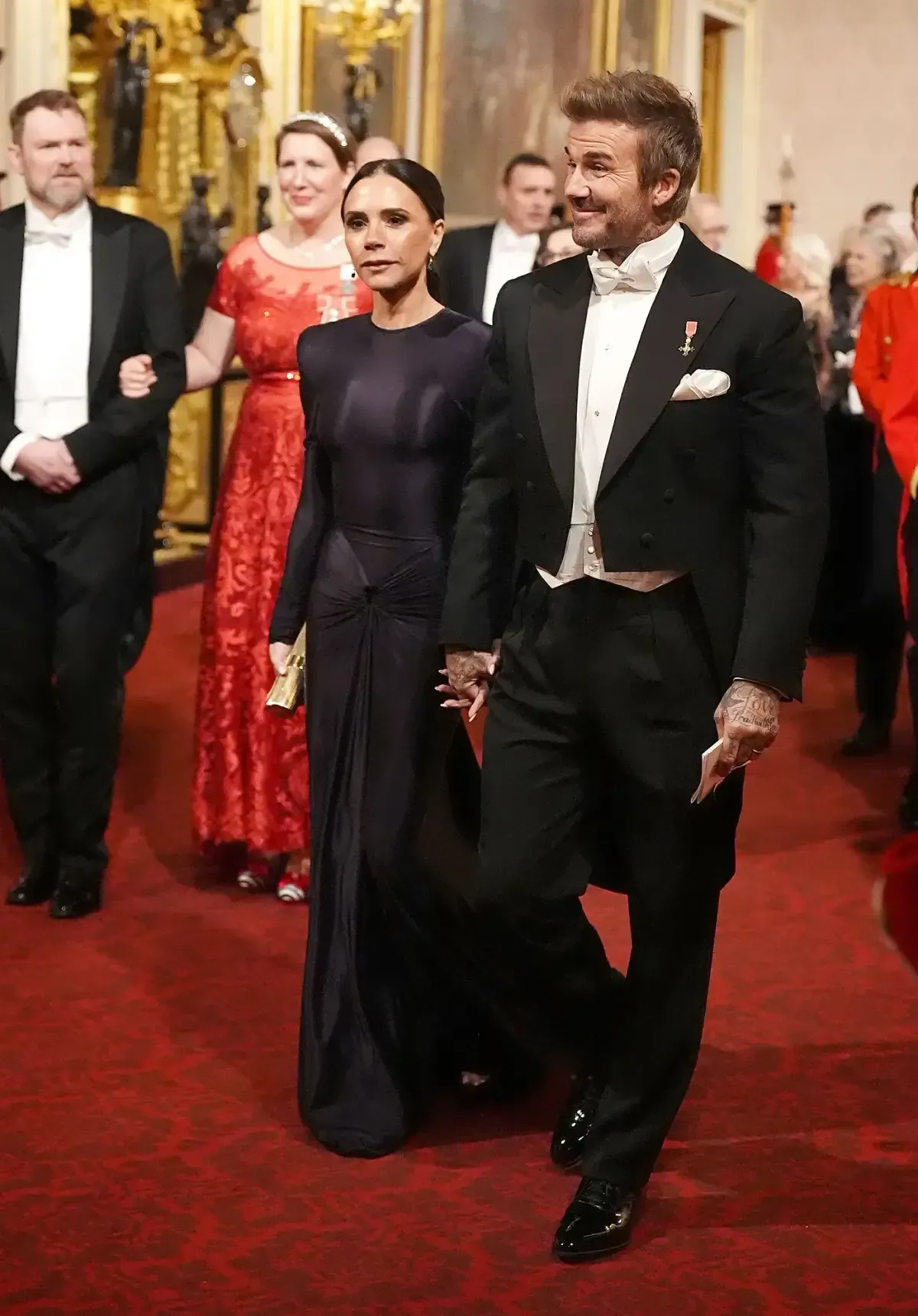 Victoria and David Beckham Make Surprise Appearance at Buckingham Palace