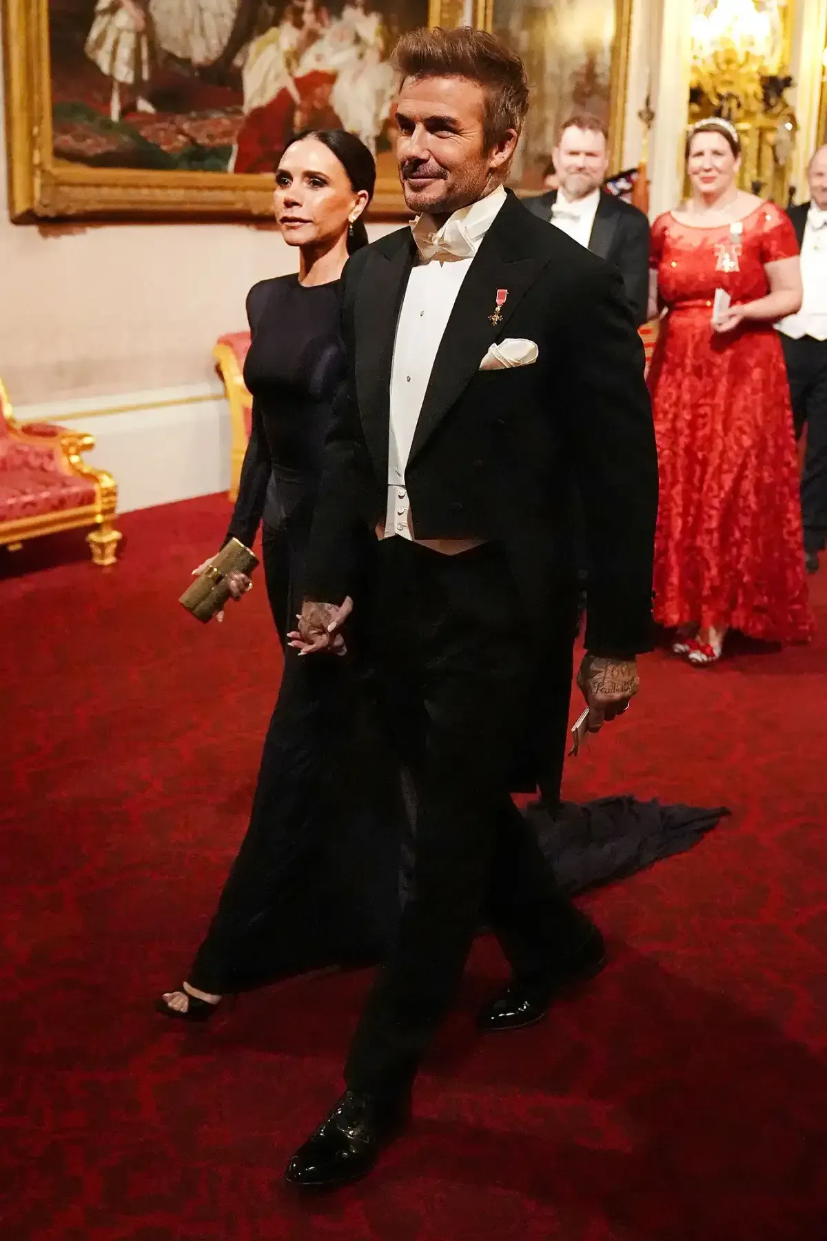 Victoria and David Beckham Make Surprise Appearance at Buckingham Palace