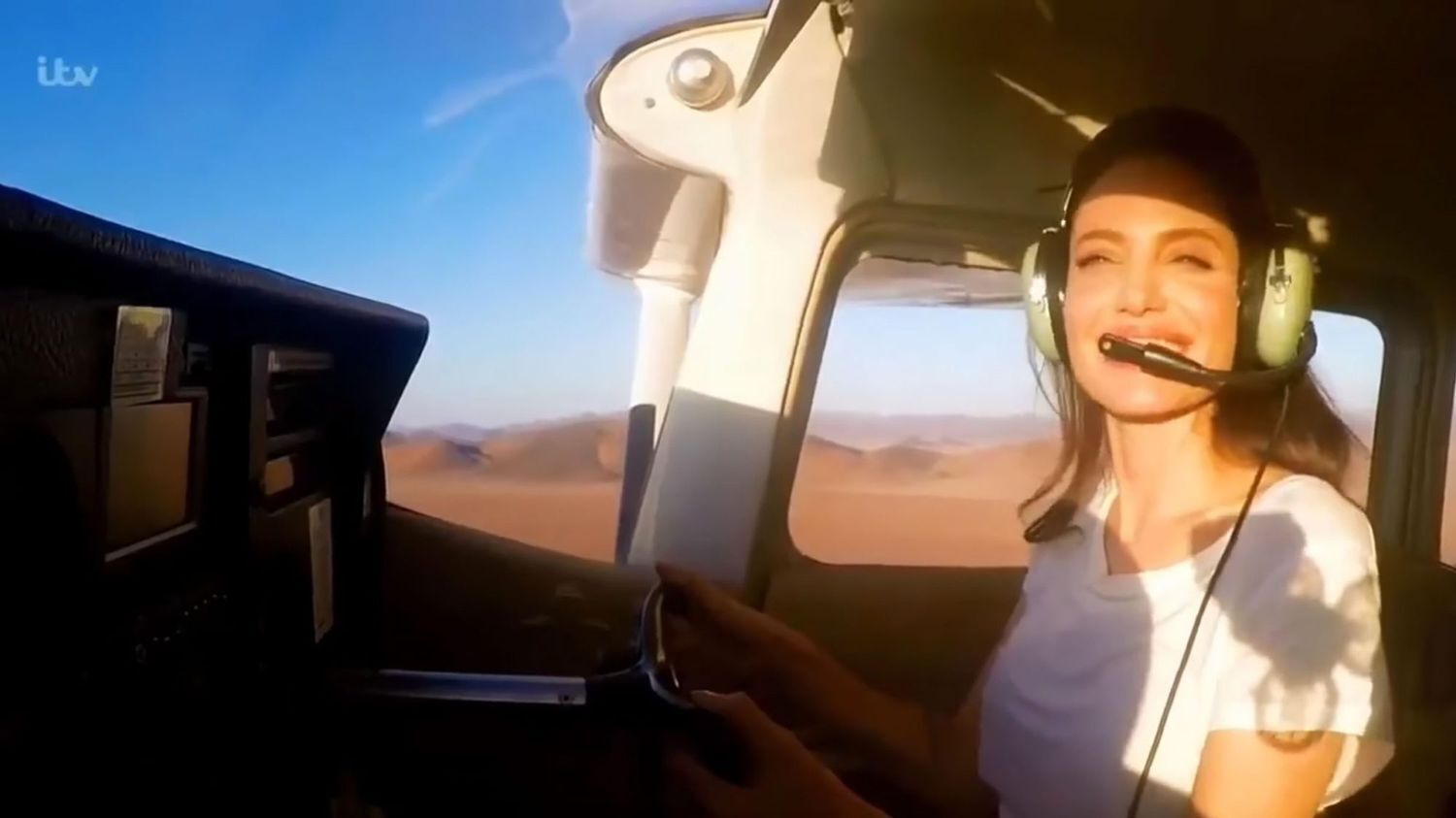 Angelina Jolie flying in ITV's 'The Queen's Green Planet'.