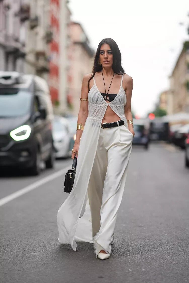 The Versatility of the Naked Dress Trend: 8 Stylish Ways to Rock It