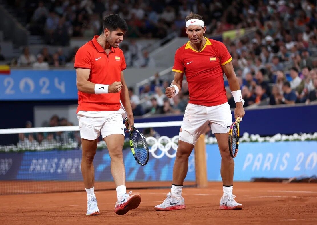 Rafael Nadal (right) and partner Carlos Alcaraz (left) of Team Spain celebrate at the 2024 Paris Olympics.