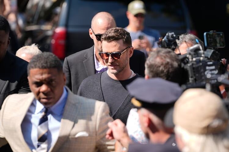 Justin Timberlake, center, walks into court for his arraignment, Friday, Sept. 13, 2024