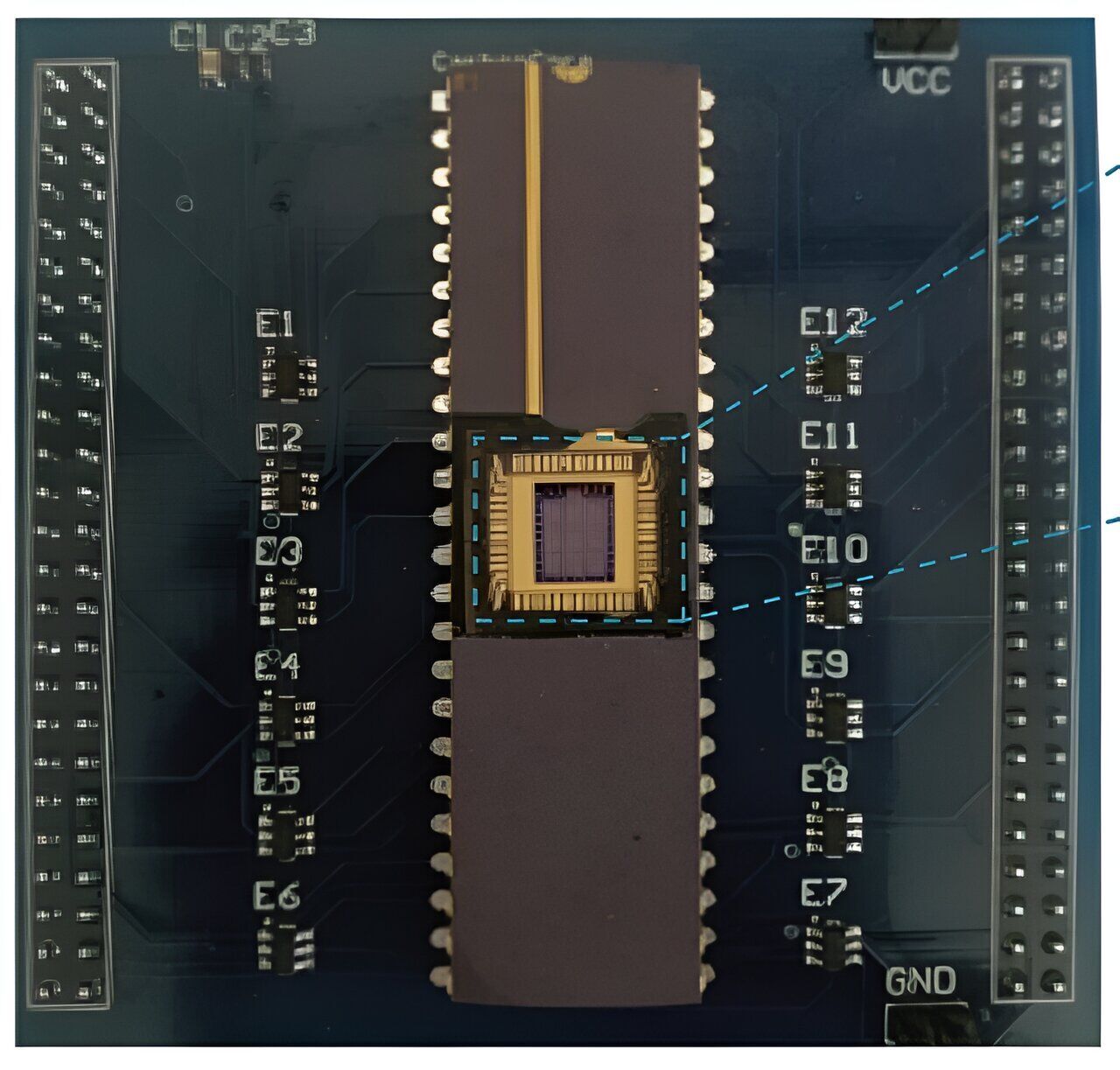 Photograph of the CNT TPU packaged on a test printed circuit board.