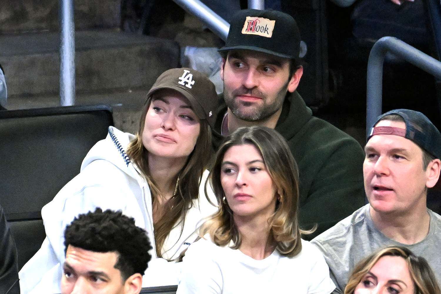 Olivia Wilde and Dane Diliegro, pictured sitting behind Kelsi Taylor and Dane Cook.