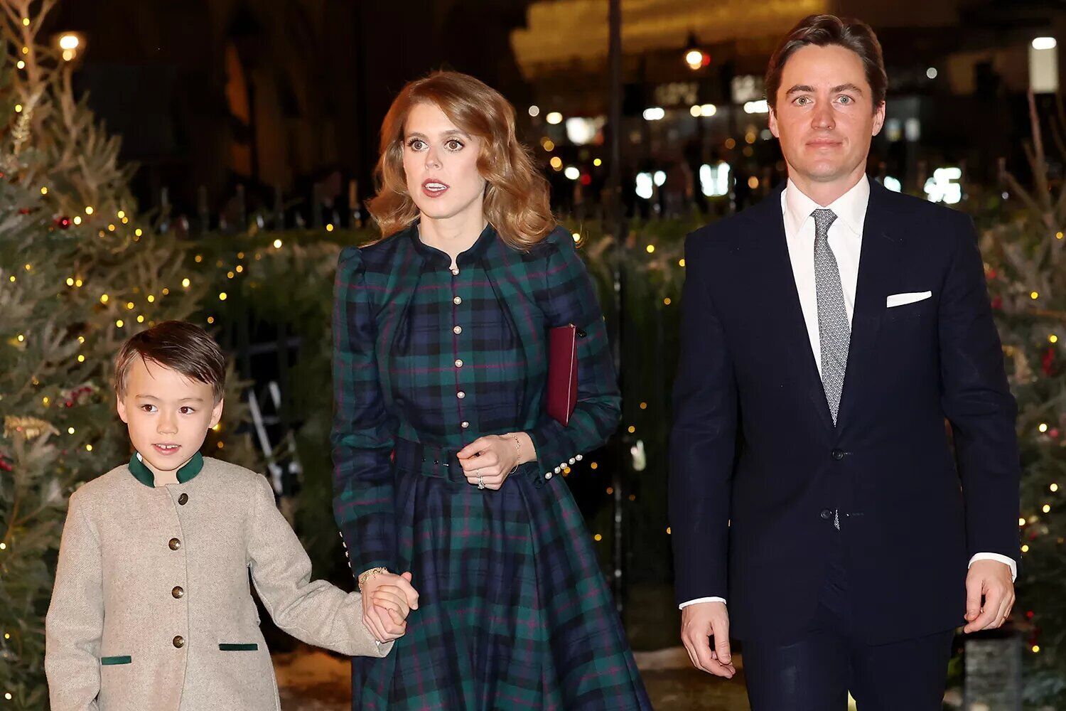 Christopher Woolf, Princess Beatrice and Edoardo Mapelli Mozzi attend The "Together At Christmas" Carol Service at Westminster Abbey on Dec. 8, 2023 in London, England.