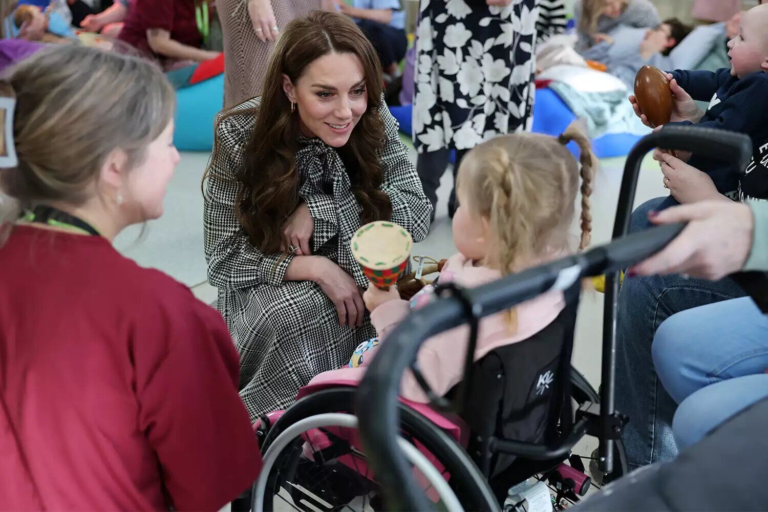 Catherine, Princess of Wales talks with 3 year old Dani-Rae during her visit to Ty Hafan, a children's hospice based in Sully, near Cardiff, which supports families in Wales to ensure that children with life-shortening conditions live fulfilling lives, on Jan. 30, 2025 in Sully, Wales.