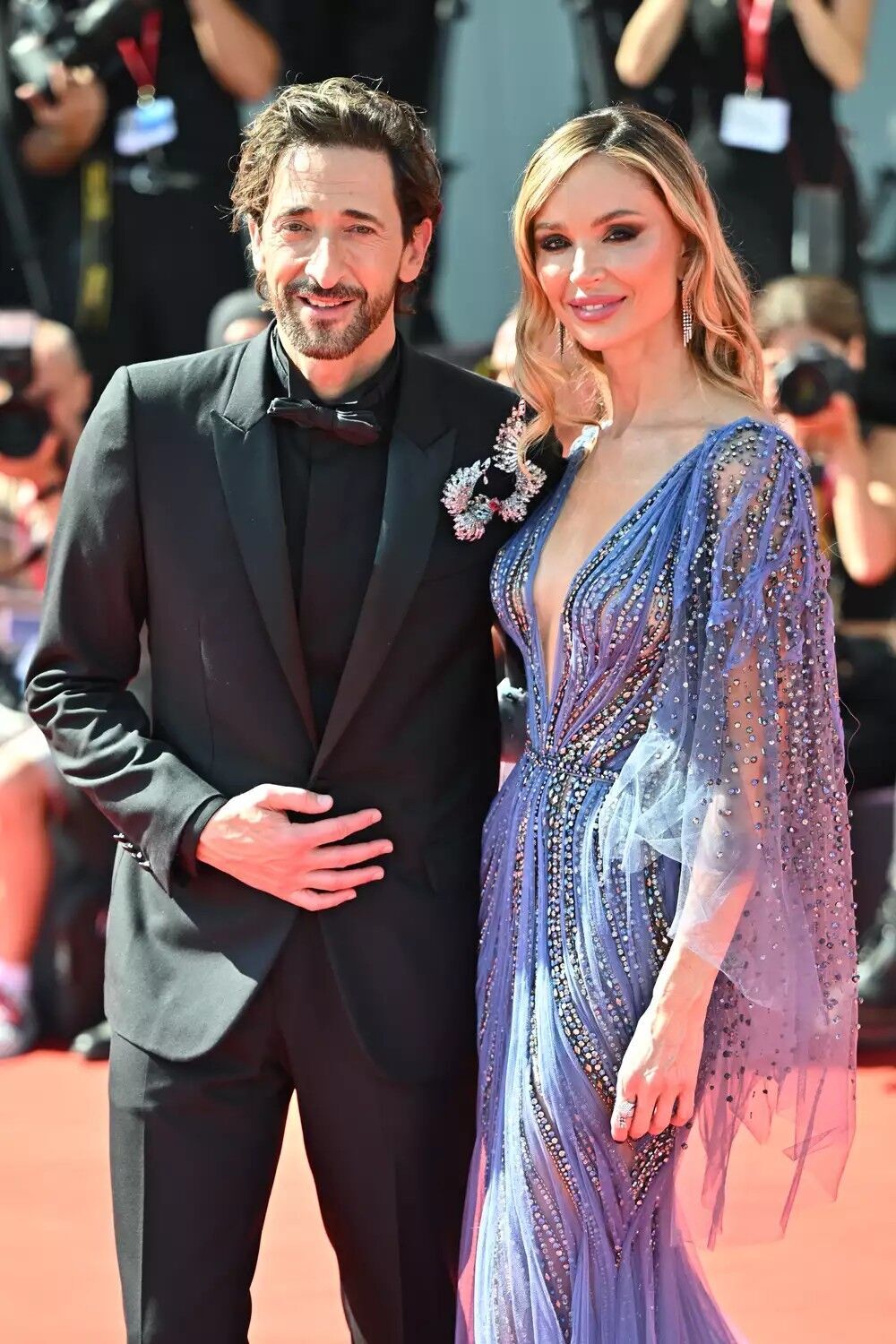 Adrien Brody and Georgina Chapman attend the "The Brutalist" red carpet during the 81st Venice International Film Festival on September 01, 2024 in Venice, Italy.