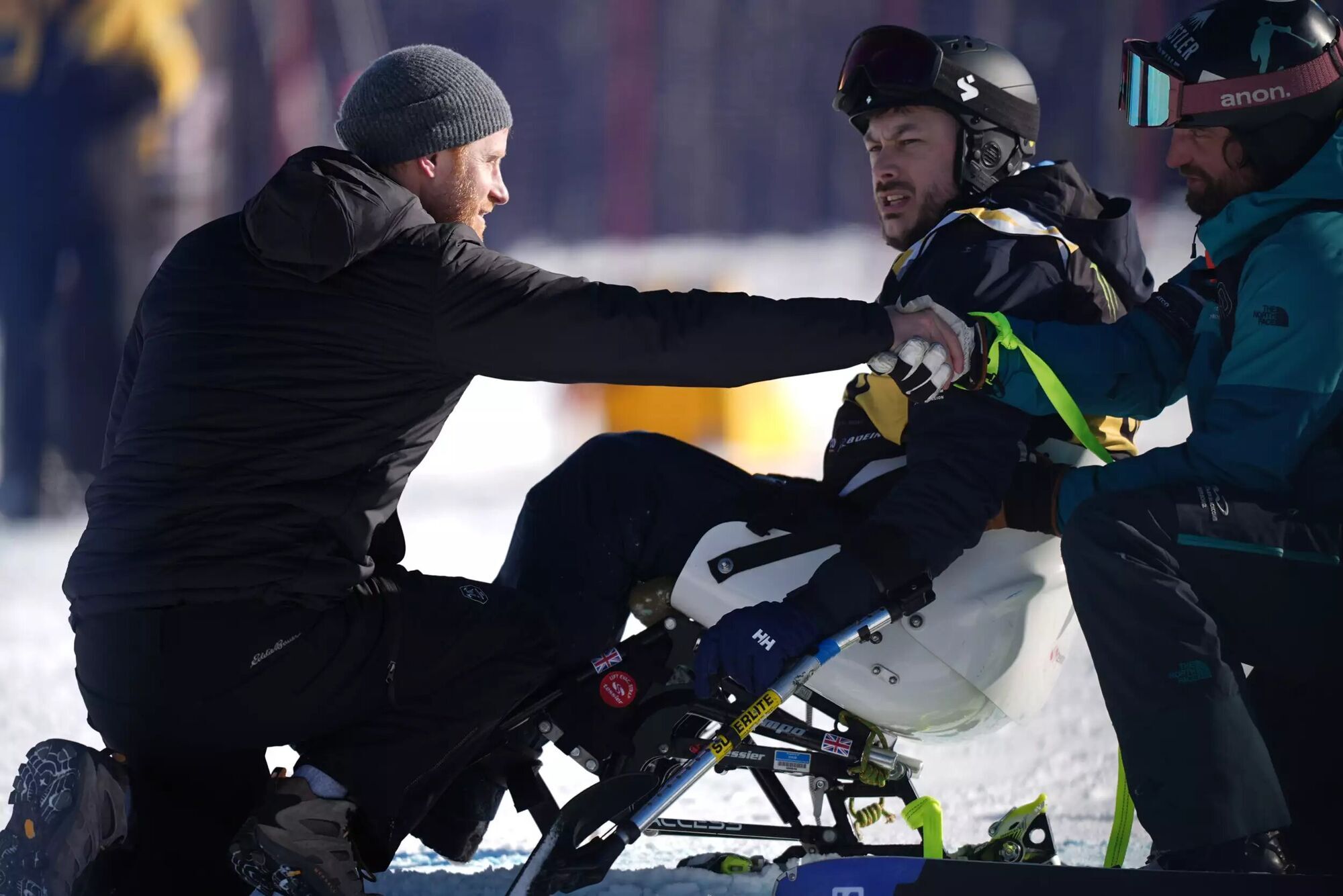 rince Harry speaks with an athlete at the alpine skiing and snowboarding novice finals during the Invictus Games Vancouver Whistler 2025 in Whistler, Canada on Feb. 11, 2025