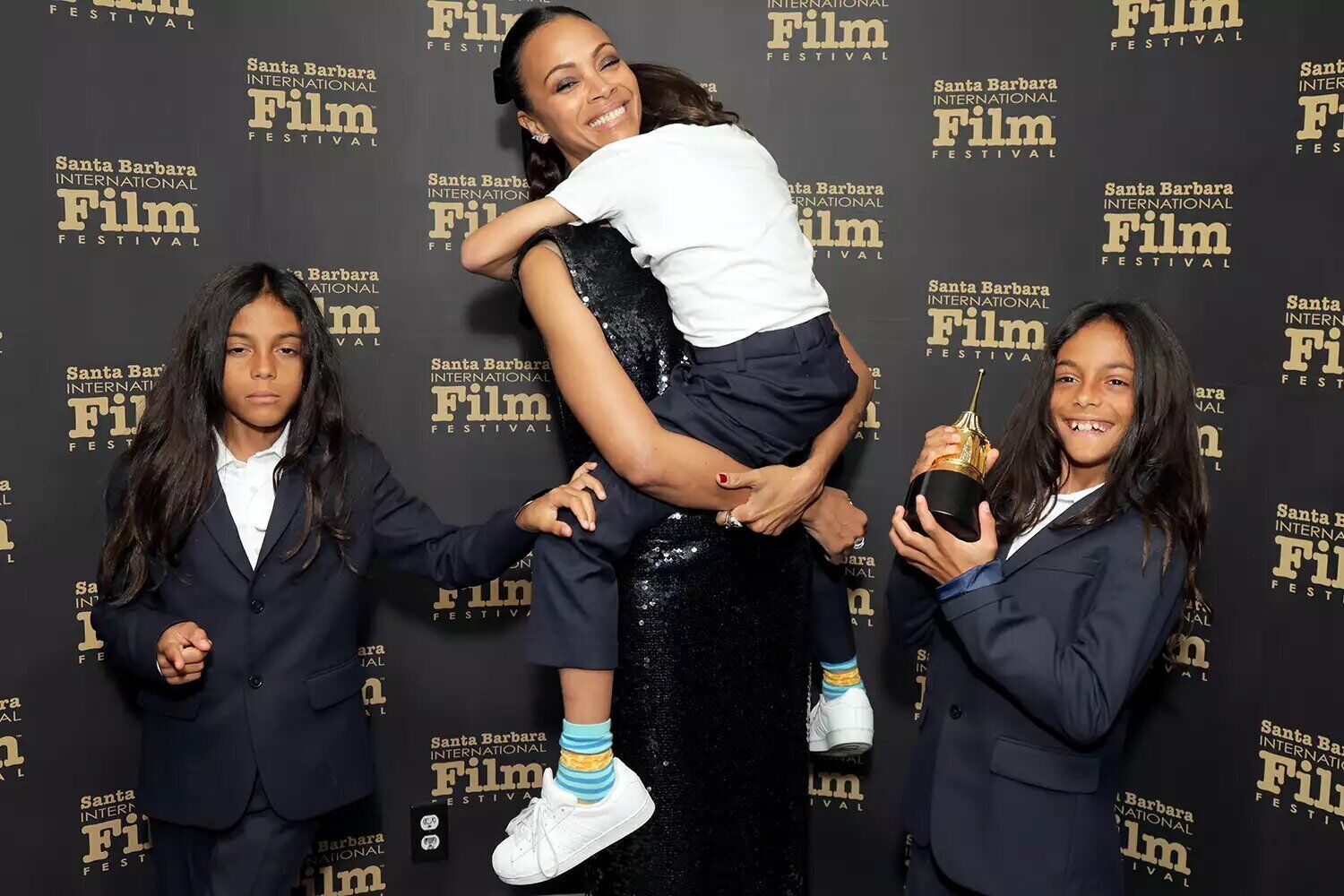 Zoe Saldaña and her sons Cy, Zen and Bowie at the 40th Santa Barbara International Film Festival Riviera Award during the 40th Santa Barbara International Film Festival on February 12, 2025.