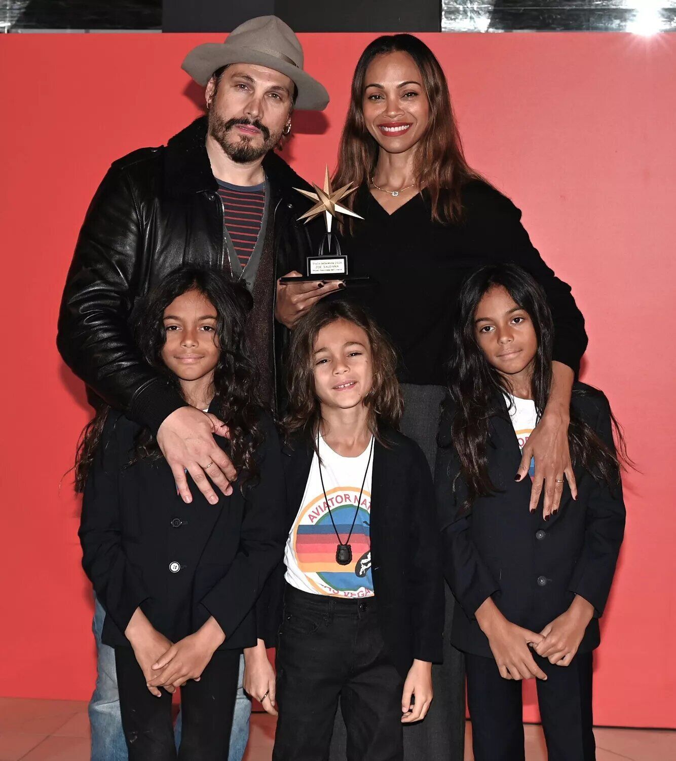 Zoe Saldaña with her husband Marco Perego and their sons.