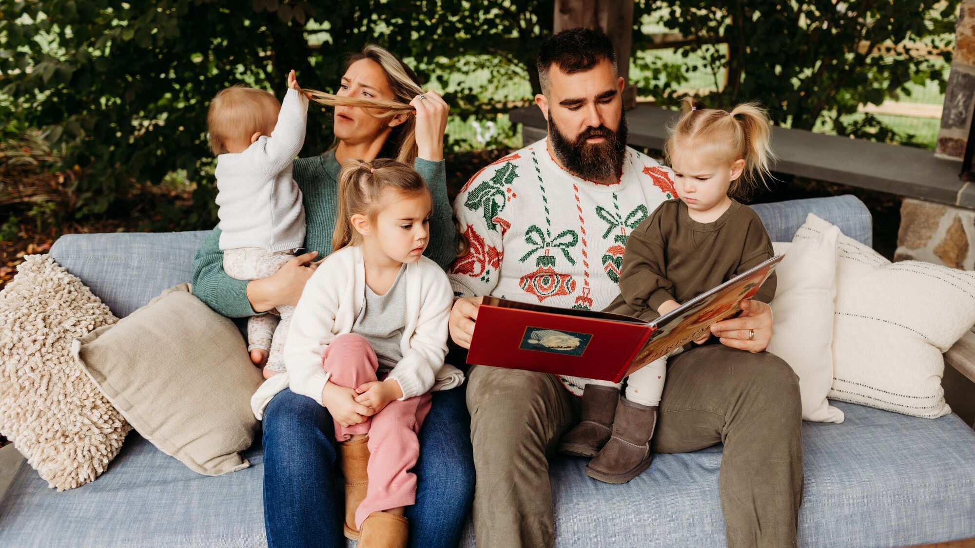 Jason and Kylie Kelce with their three kids.