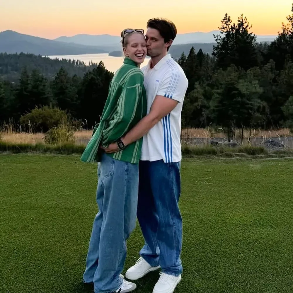 Patrick Schwarzenegger and Abby Champion share a sweet moment in front of a sunset.