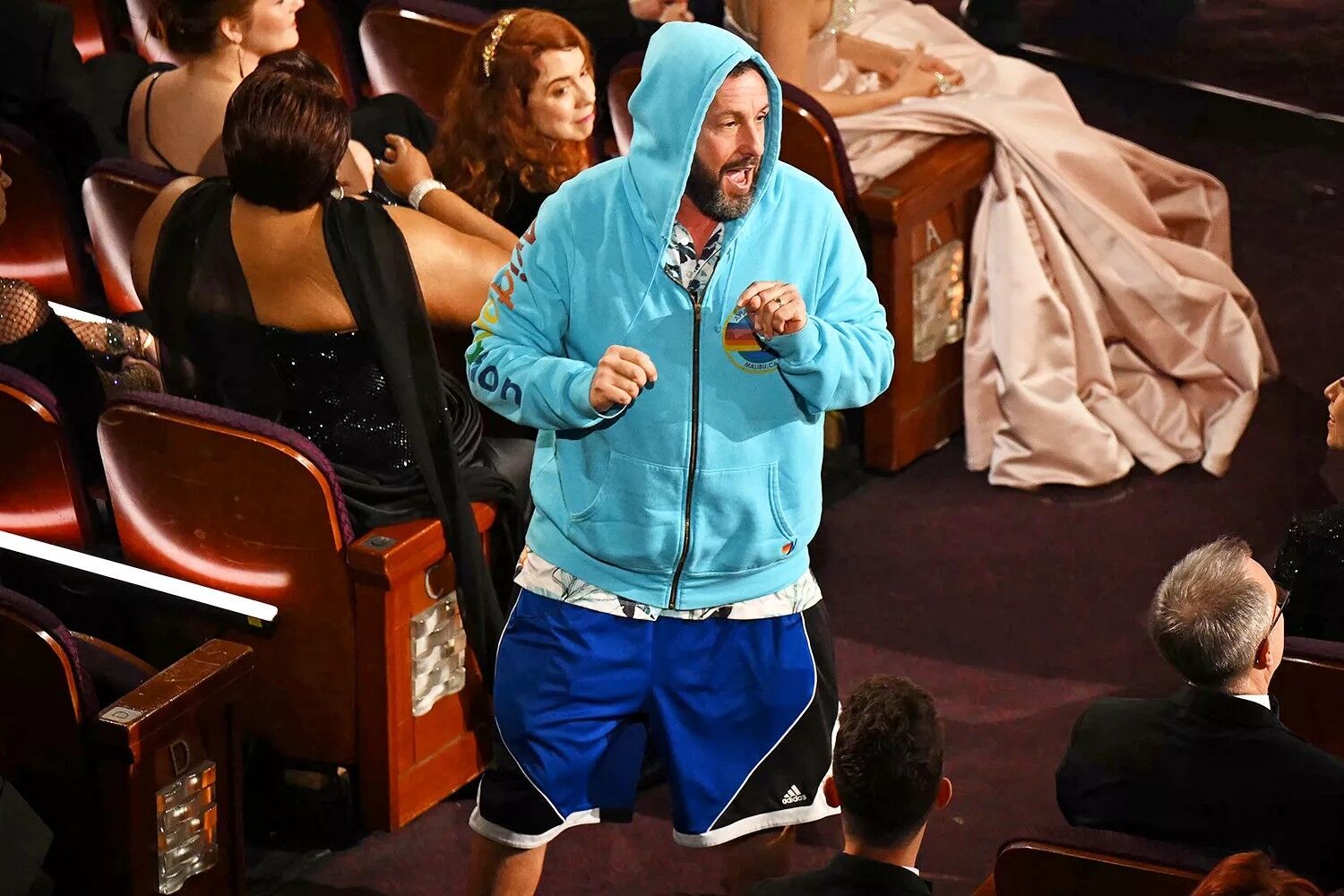 Adam Sandler Crashes the 2025 Oscars in a Hoodie and Basketball Shorts ...