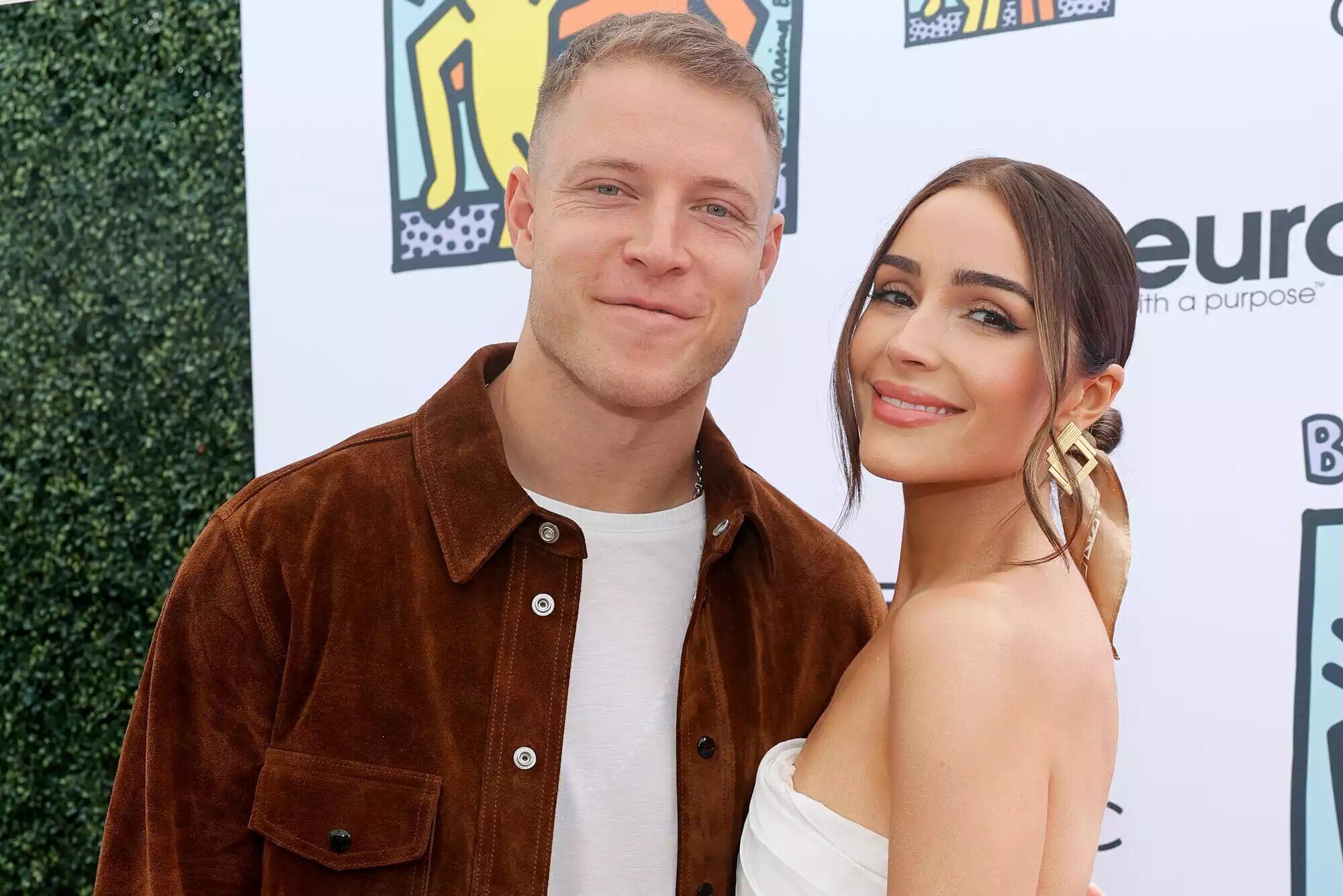 Christian McCaffrey and Olivia Culpo