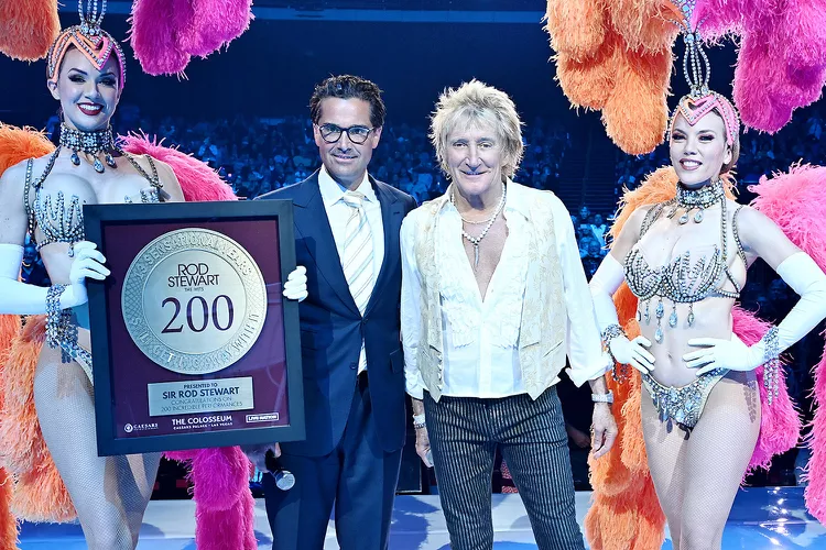 Rod Stewart celebrates his 200th show with Regional President of Caesars Entertainment Sean McBurney at The Colosseum at Caesars Palace in Las Vegas on March 12, 2025.