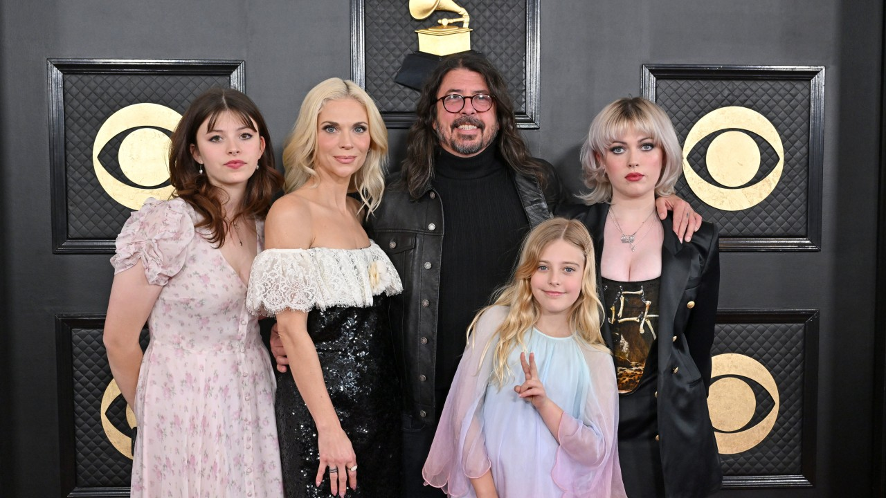 Dave Grohl with his wife Jordyn Blum and three daughters, Ophelia, Harper and Violet, at the 2023 Grammys