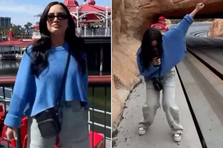 Demi Lovato dancing at Disneyland.