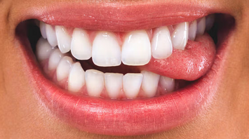 Spiritual Meanings of Biting Your Tongue