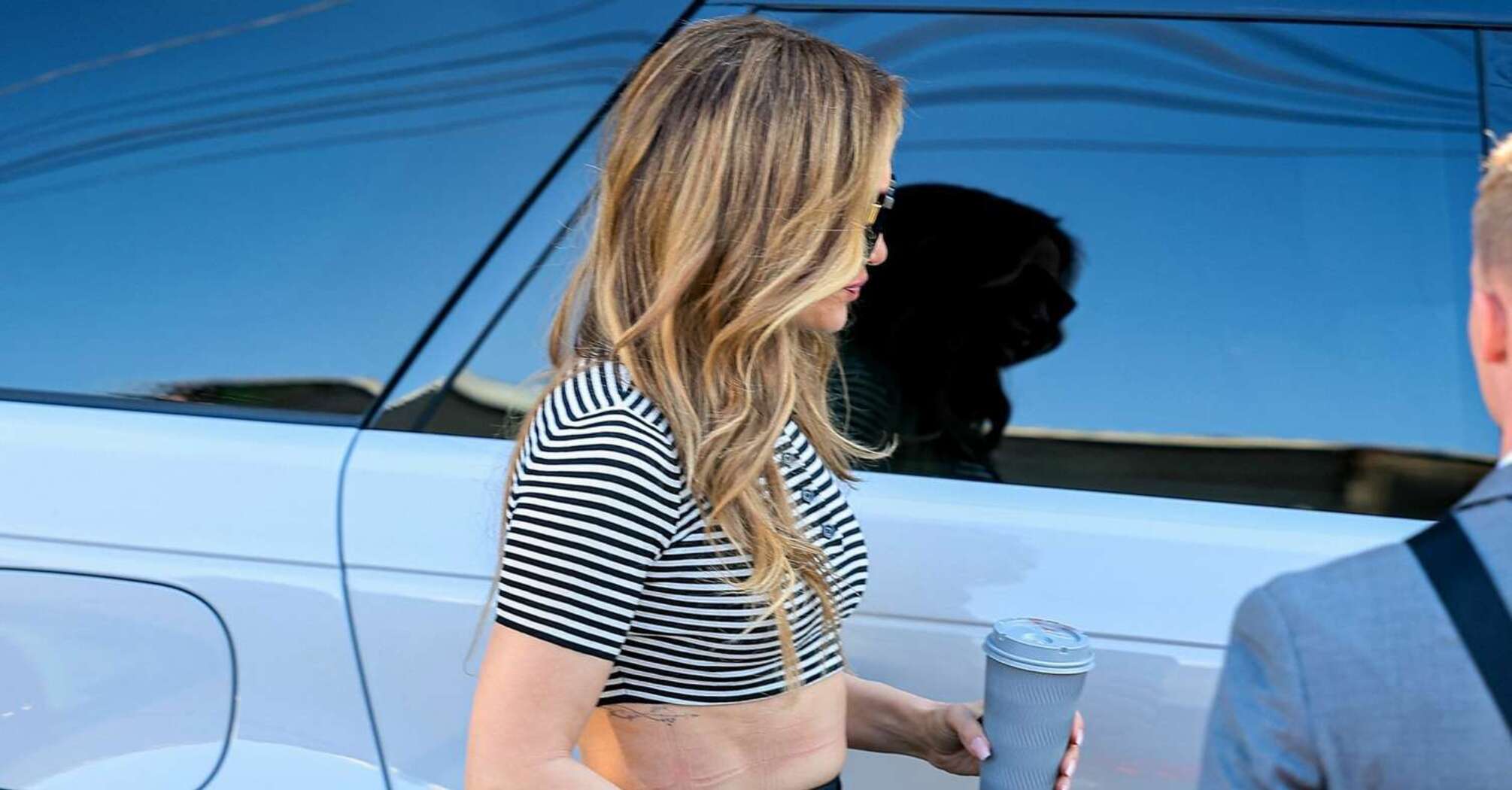 Jennifer Lopez Caught Leaving Los Angeles Studio in Fashionable Crop Top