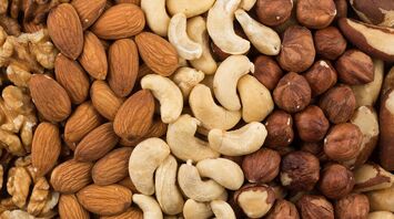 What does dreaming of Nuts signify?